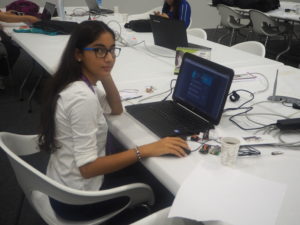 Aydan Huseynova behind her laptop